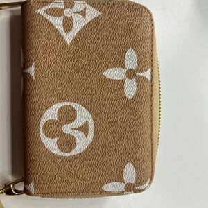 Selling a wallet. Cute with lots of room